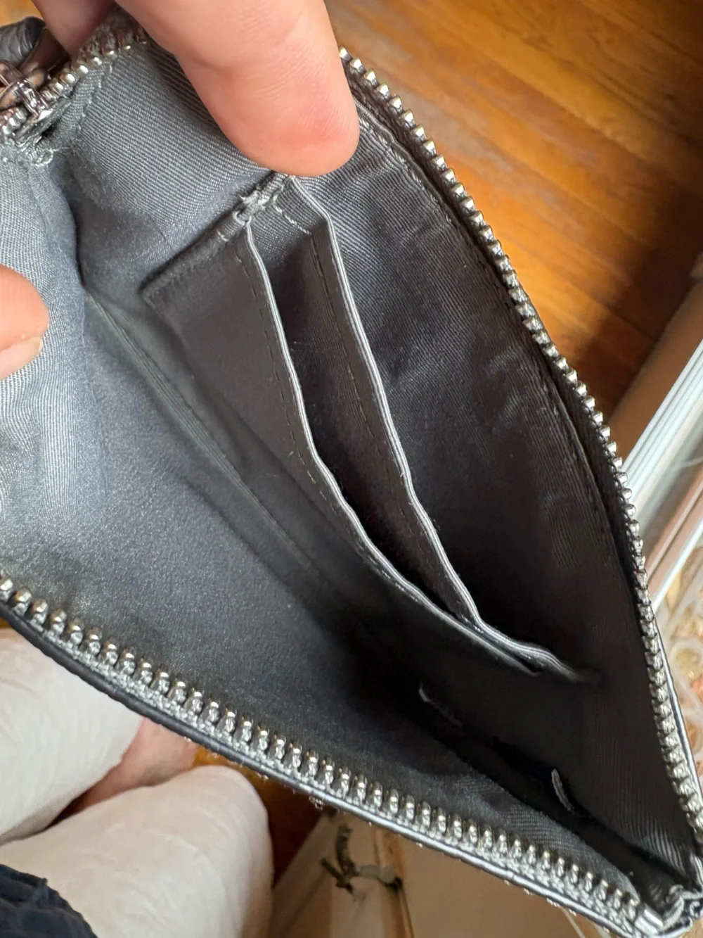 Coach Corner Zip wristlet in a metallic crossgrain leather